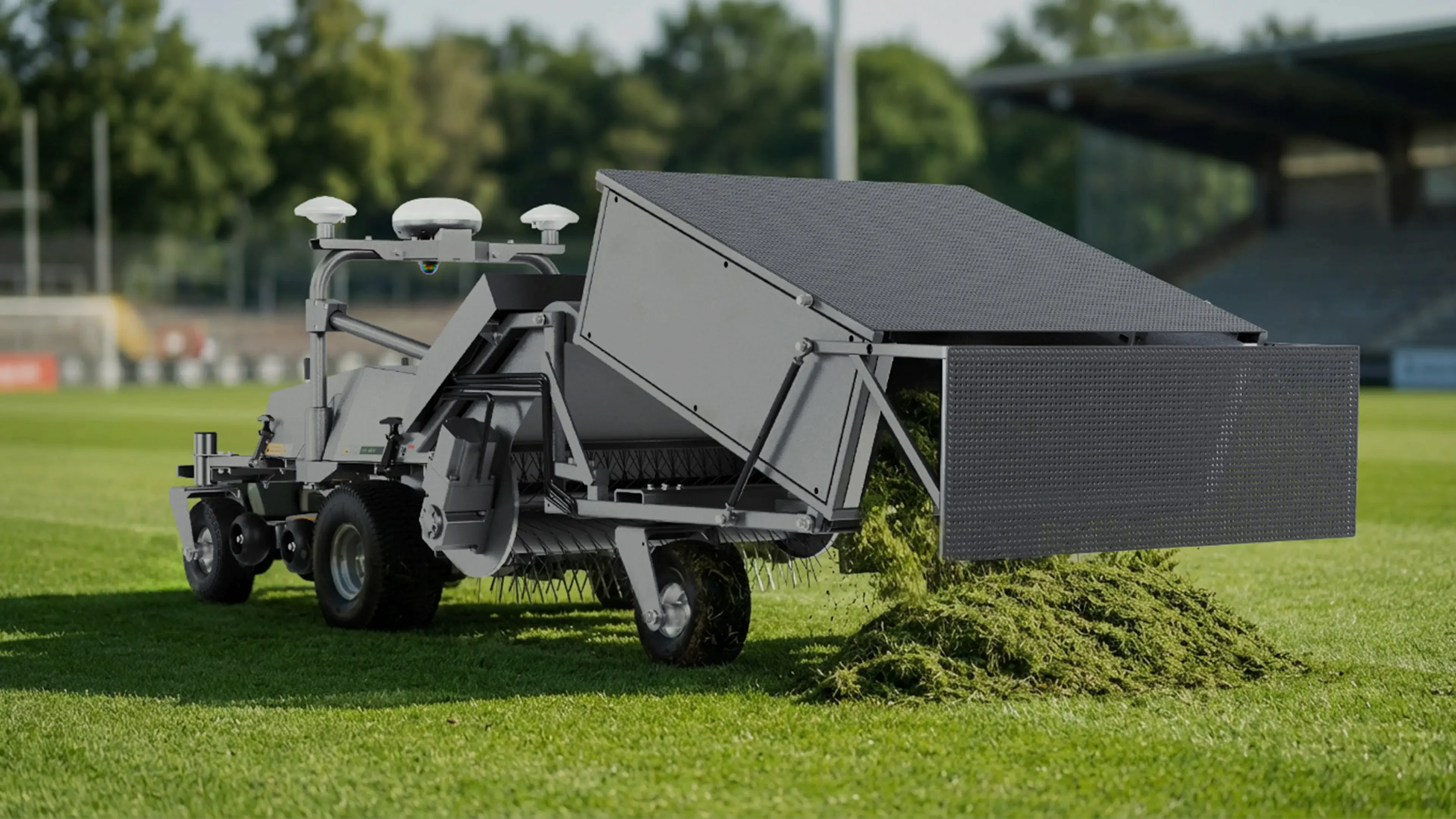 FJD RM21 tipping collected grass clippings from its hopper