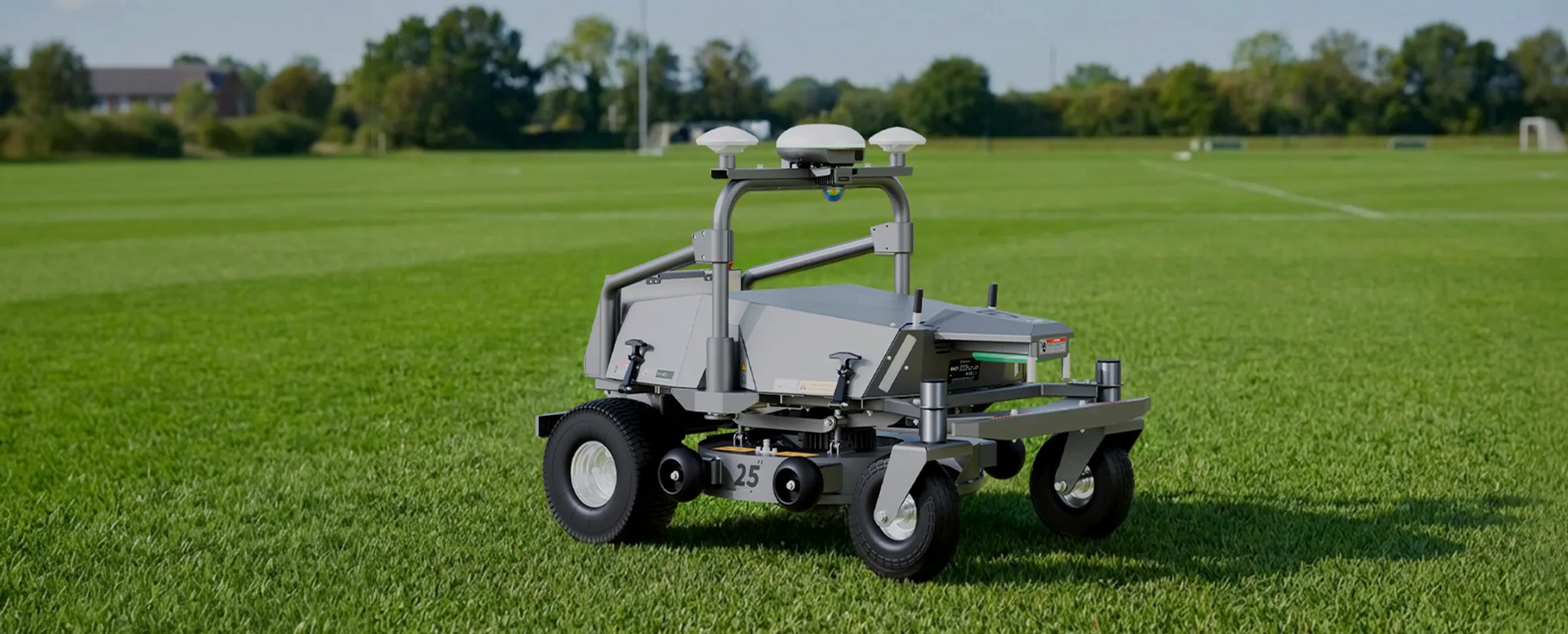 FJD RM21 mowing a sports field, wide view